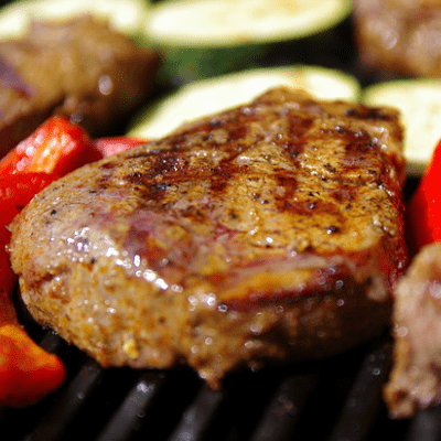 Barbequing a mature Park Cattle steak