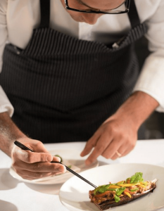 Chef preparing a fine dining experience